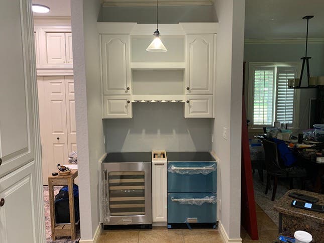 Built-In Bar Cabinetry with Liquor Drawer and Stemware Holder