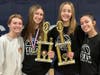 Veritas senior girls with the regular season and tournament trophies.