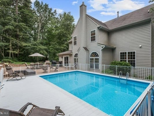 The in-ground pool is the main highlight of this $699,000 Severn home.