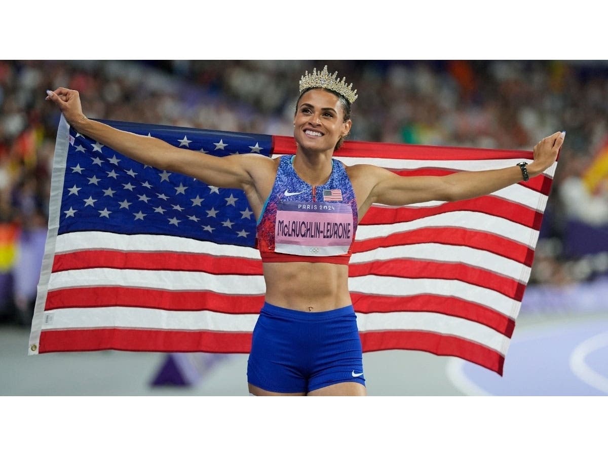 Sydney McLaughlin-Levrone, of the United States, celebrates after winning the women's 400-meter hurdles final.