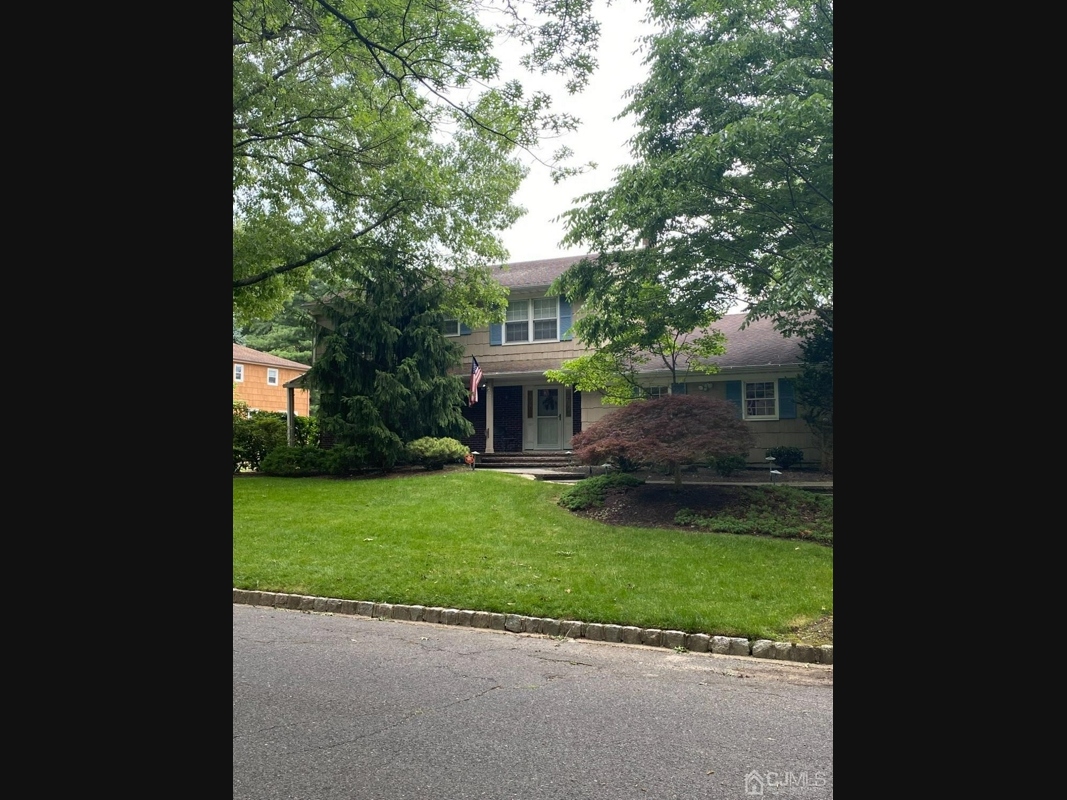 This East brunswick Home Has A Saltwater Pool & Scenic Backyard