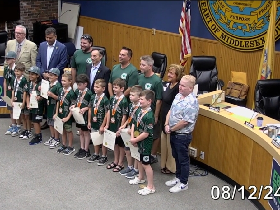 Council members with the players and coaches. 