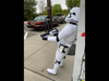 A "Stormtrooper" pointing a blaster.