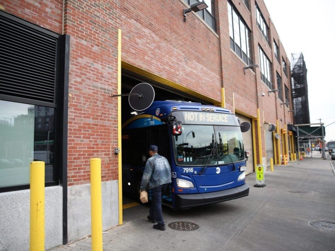 Workers at the MTA’s East New York bus depot, Dec. 1, 2023.