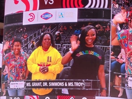 Atlanta Public School teachers Ce'Zane Grant, Benita Simmons and Gaynell Troy were honorary co-captains Monday night at an Atlanta Hawks game at State Farm Arena. They were honored as part of Clorox and the Hawks' "Year of the Teacher." initiative.