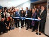 Herricks Board President James Gounaris led the ribbon cutting at the high school's renovated auditorium. 