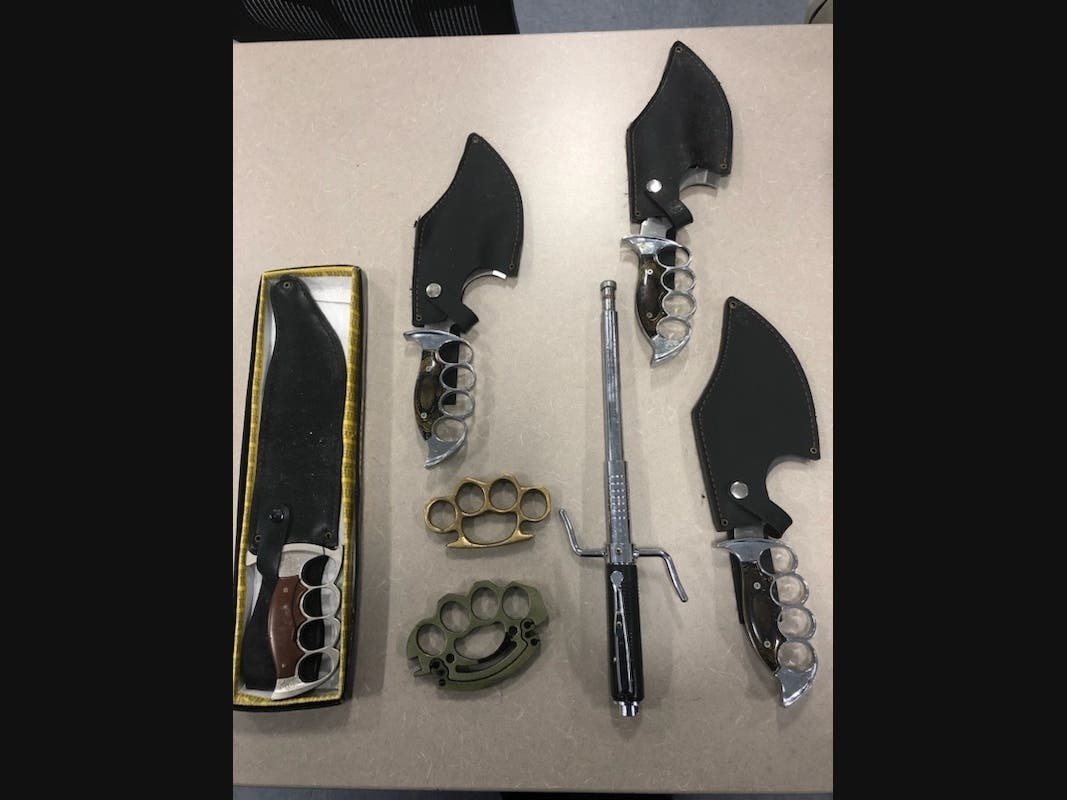 Among the items recovered from Joseph Zuziela's vehicle were knuckle knives and a baton, police said. 