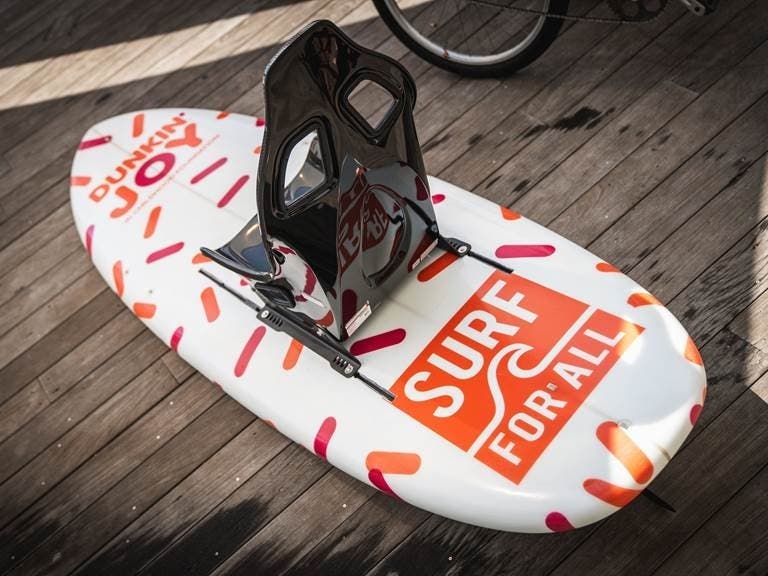 A new adaptive surfboard for children with disabilities is being unveiled in Long Beach. 