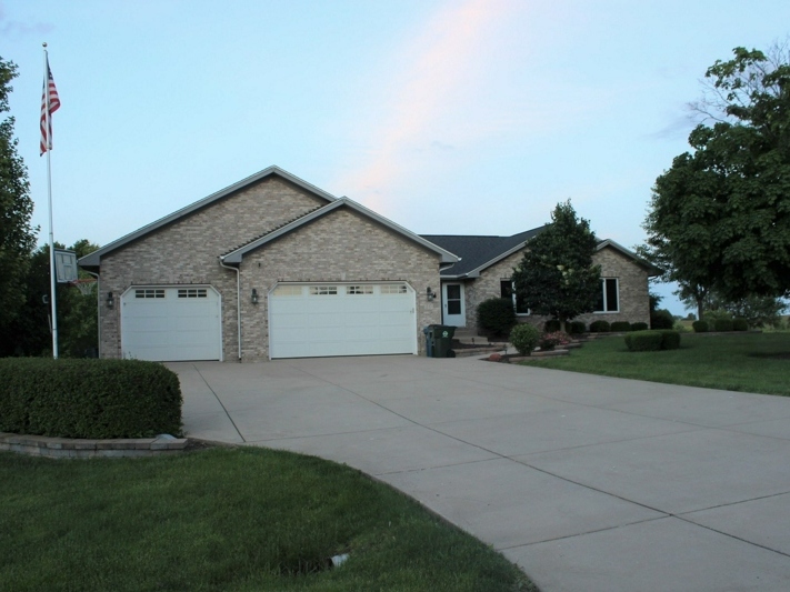 The five-bedroom house is located at 10 Red Hawk Drive in Oswego.