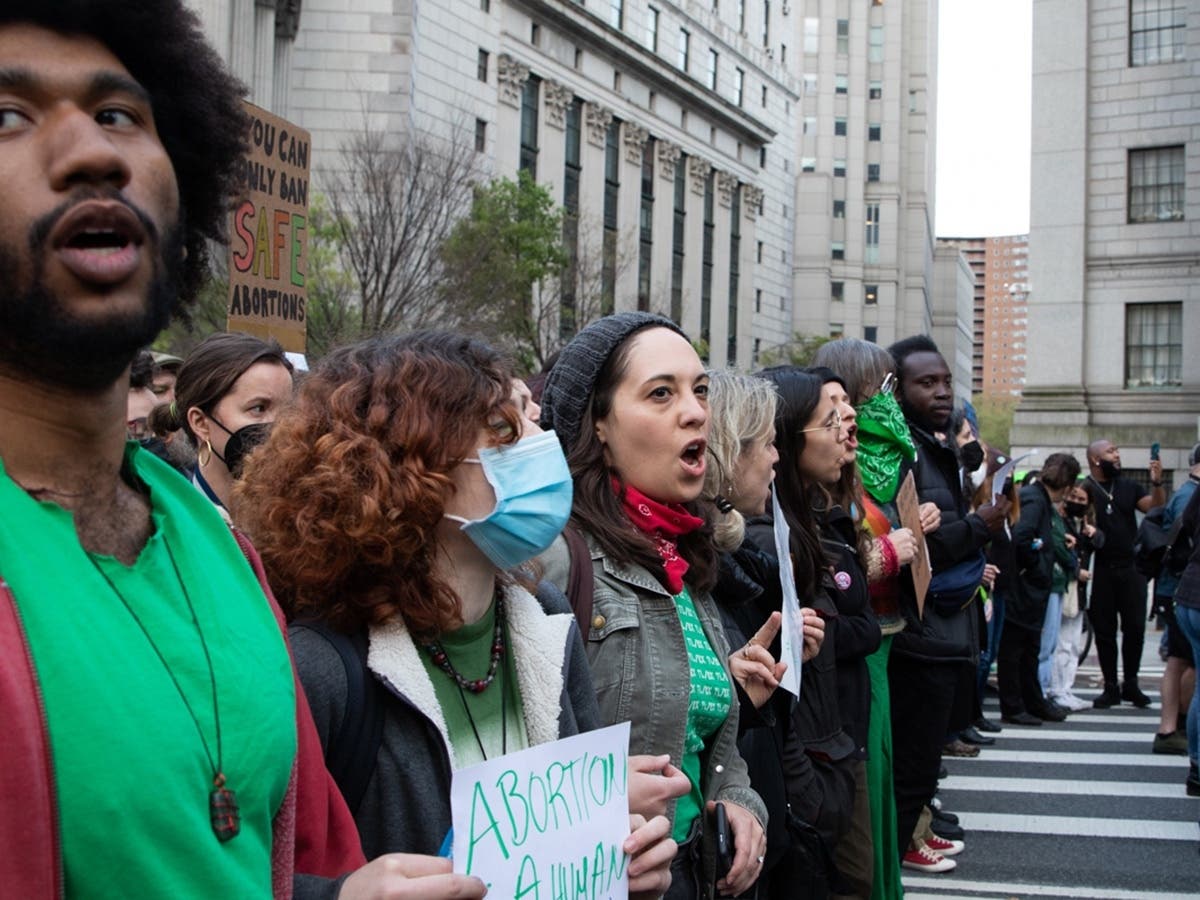 Protesters link arms at a demonstration in Manhattan's Foley Square on Tuesday.