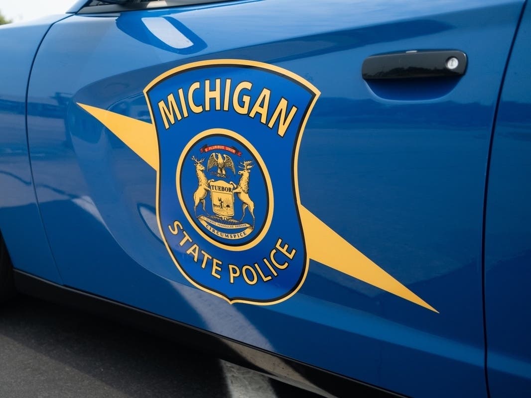 The 23-year-old Dearborn Heights woman was arrested for impaired driving and being held, pending prosecutor review, according to police.​​​​