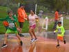 Runners of all ages participate in a Color Run to raise funds for the opioid and heroin crisis,