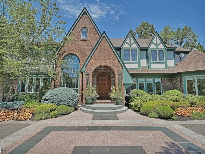 With a pool, pool house, and wine cellar, this four-bedroom Mendham home is an entertainer's paradise.