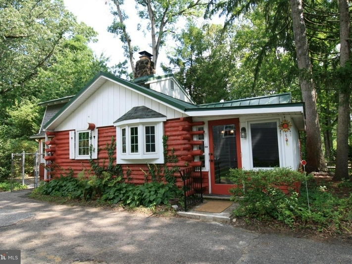 This Adorable Mount Laurel Log Cabin Can Be Yours For Just $260,000