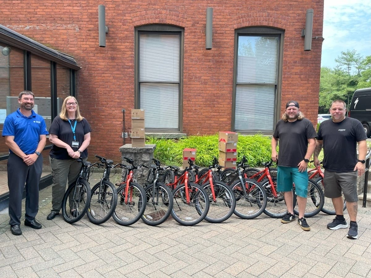 From left: ​RSI President Joe Gleason; BBBS Community-Based Program Director Tara Gill, Biker's Edge Torrington manager Tyler Johnson, and Biker’s Edge manager Pete Burr. RSI and Biker's Edge donated and assembled bicycles for clients of BBBS of CT.