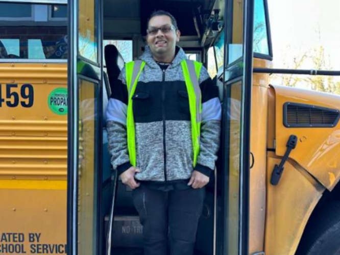 Durham Bus Services driver Arqam Ali arriving at Wrightstown Elementary School Monday morning.