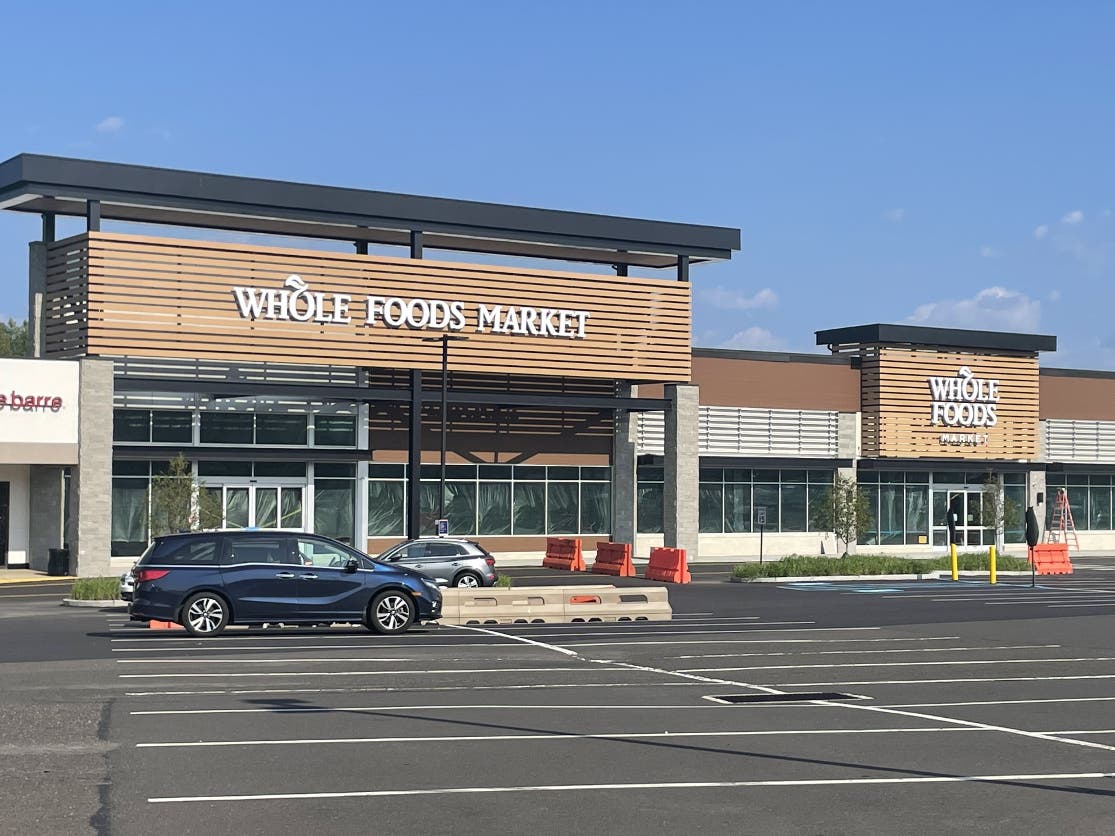 New signage has been installed at the future home of Whole Foods Market.