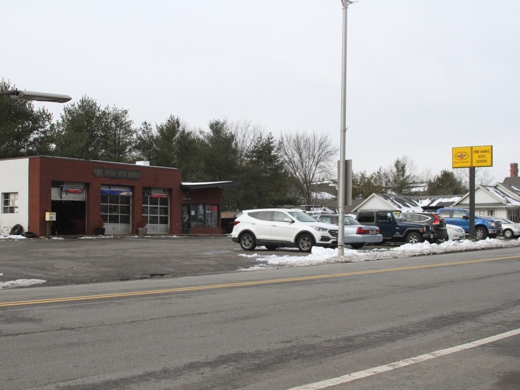 Work on a proposed Popeyes location on Main Street in Malden would involve demolishing the existing Pine Banks Auto Center, according to city Building Commissioner Nelson Miller.