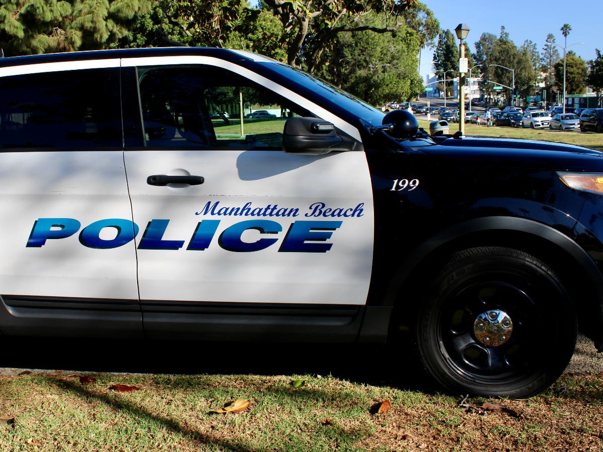 A man's body was found lying on the ground near the pond in Manhattan Beach's Polliwog Park Monday morning.