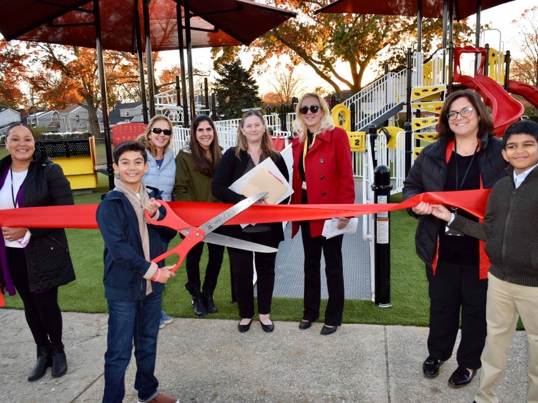 A ribbon cutting ceremony was held at Manor Oaks School for a new inclusive playground.