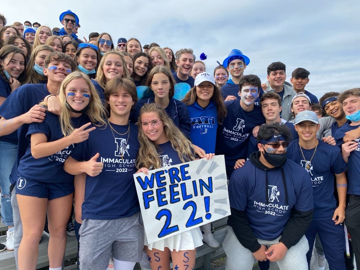 Immaculate students make friends easily through 35 extracurricular clubs and 39 sports teams. The Mustang Stable fan group is pictured here at a football game. 