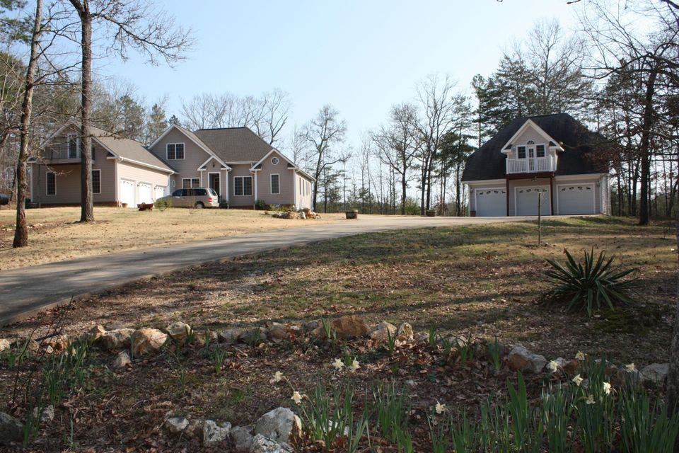 Beautiful Custom-built, one owner homes located on 3 acres with 3 completely separate living areas!!