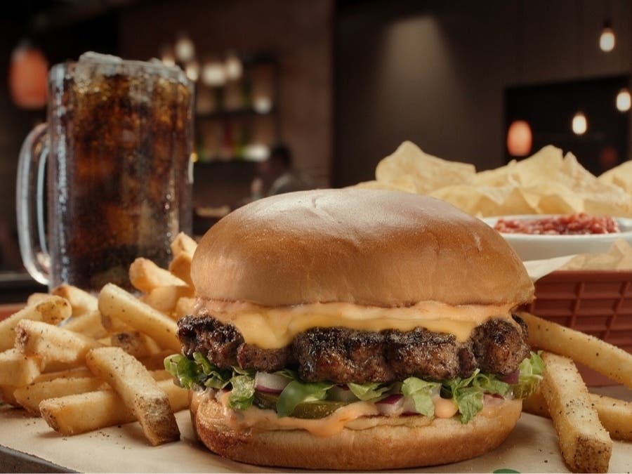 Move over, McDonald's: Chili's 3 for Me menu offers a burger, fries, appetizer and drink for $10.99, nearly the same price as a Big Mac combo.