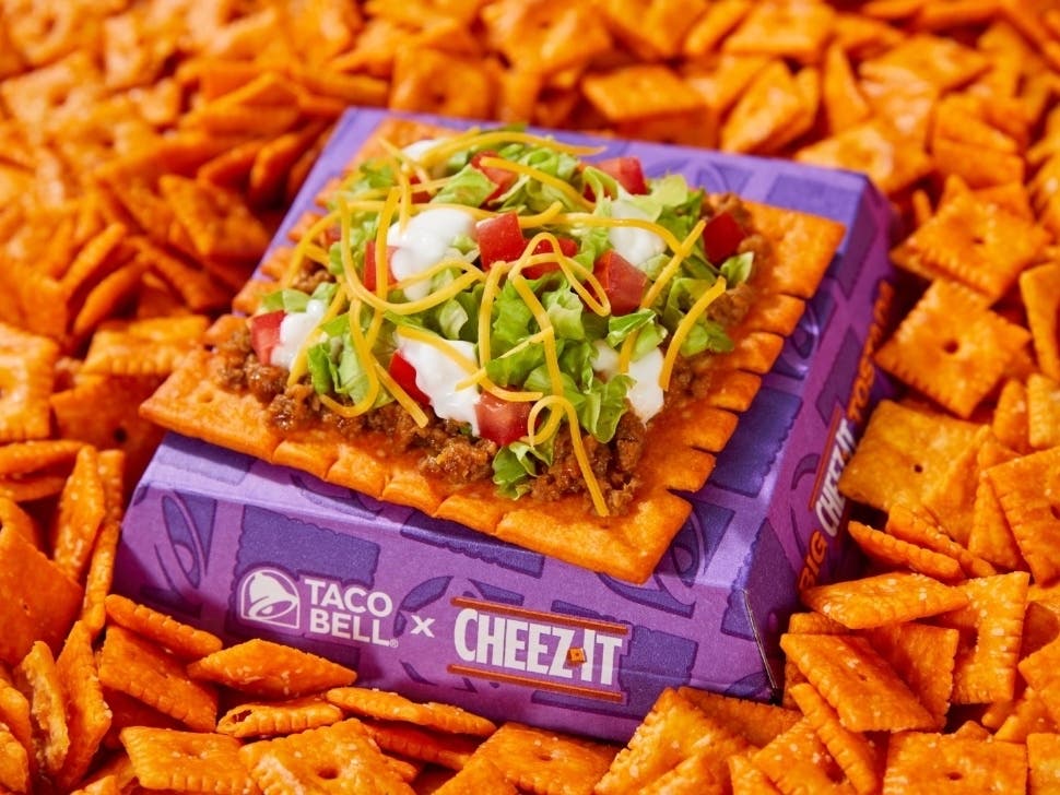 Yes, that's a giant Cheez-It carrying a foursome of familiar Taco Bell ingredients.