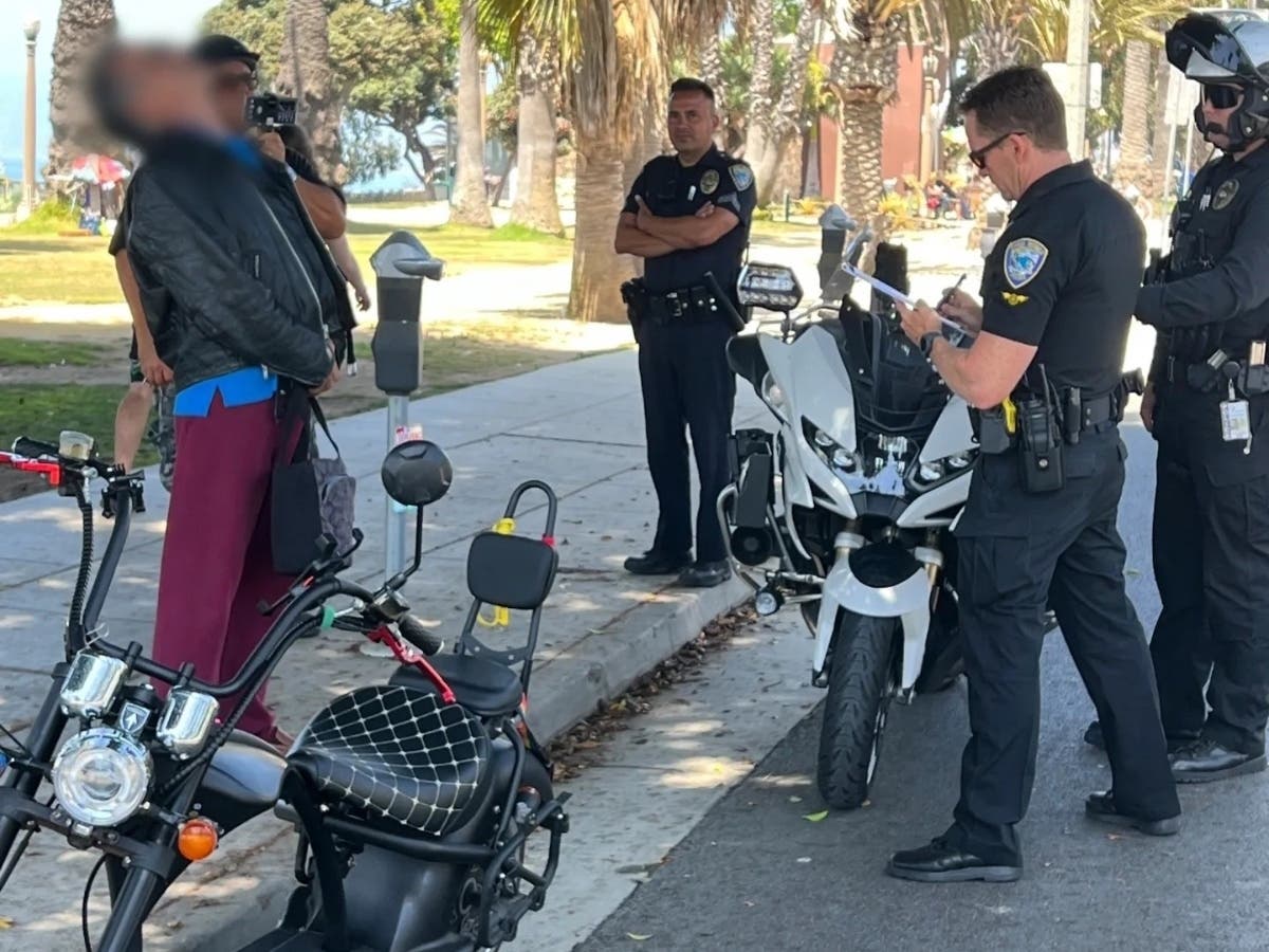 An unlicensed motorcyclist is facing legal trouble after Santa Monica police caught him driving in a bike lane, police said.