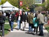 Students, faculty, alumni and community members walking around Voorhees Mall.
