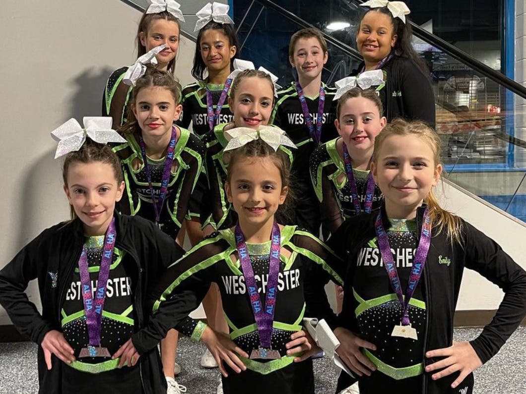 Local Cheerleading Program Climbs their way to the D2 Summit.