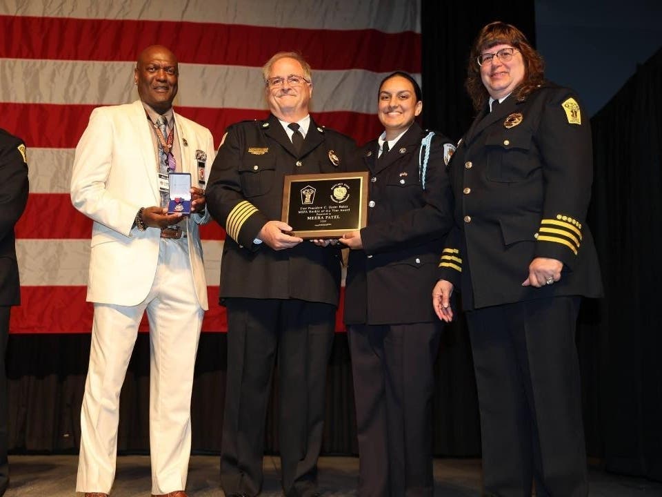 Eric Smothers, left and Meera Patel second from right