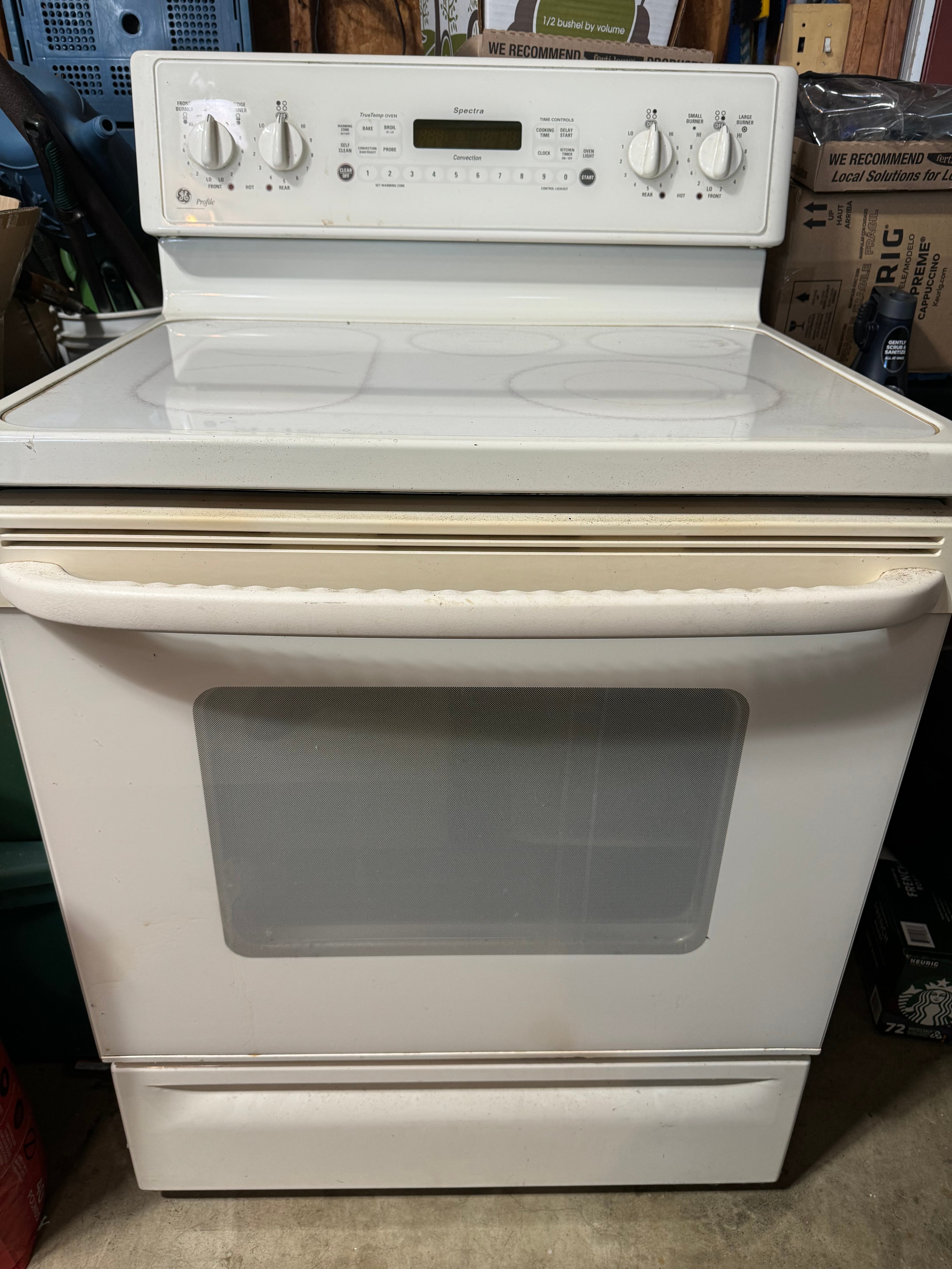 Free GE Profile convection oven & cook top. 