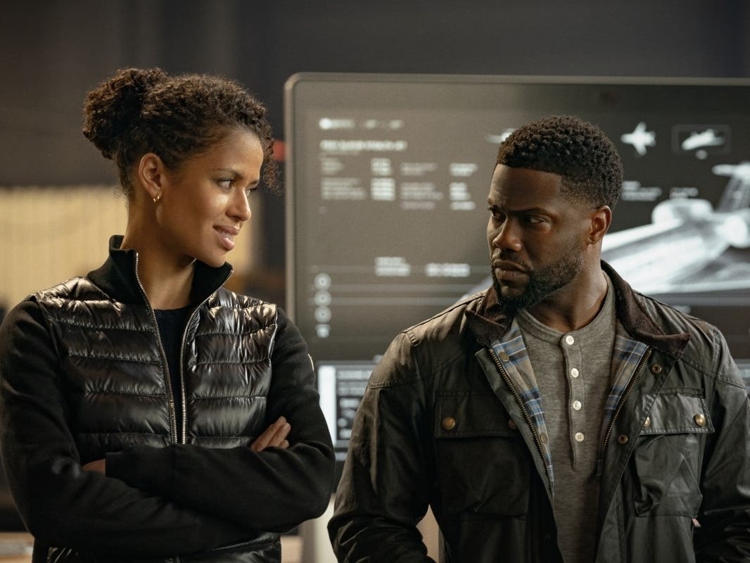 Gugu Mbatha-Raw as Abby and Kevin Hart as Cyrus in "Lift."