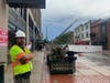 City crews were on the scene Sunday morning amid a building collapse caused by a severe storm on Joliet's Cass Street.