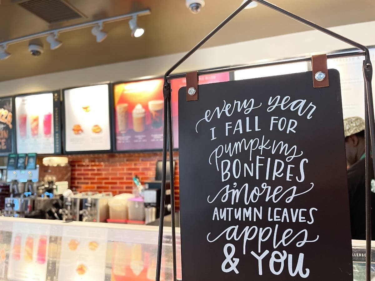 A sign in a Starbucks store in Montecito, California, heralds the return of Pumpkin Spice Latte to the menu and the impending arrival of fall. Starbucks’ iconic drink turns 20 this year, and its influence is seen across a range of products.