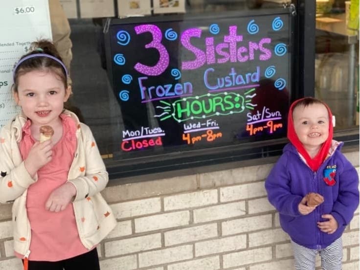 Partial owner Michelle Gibbons Warren's daughters Faith and Allison outside 3 Sisters Frozen Custard.