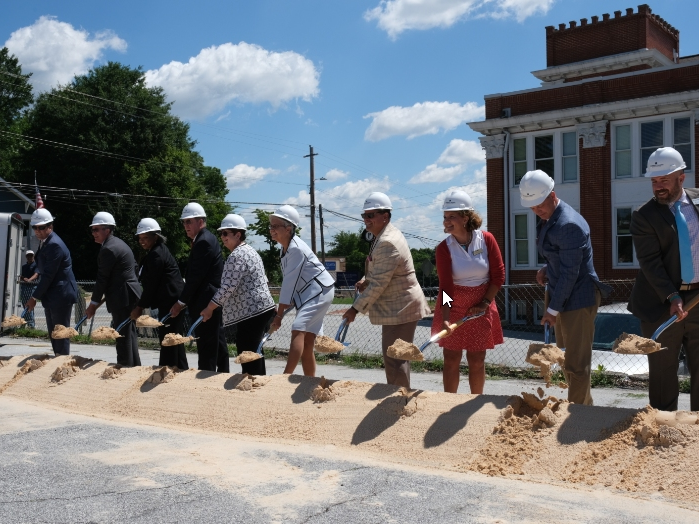 Elected leaders and Aurora Theatre executives celebrated the start of construction on new Performing Arts Center.