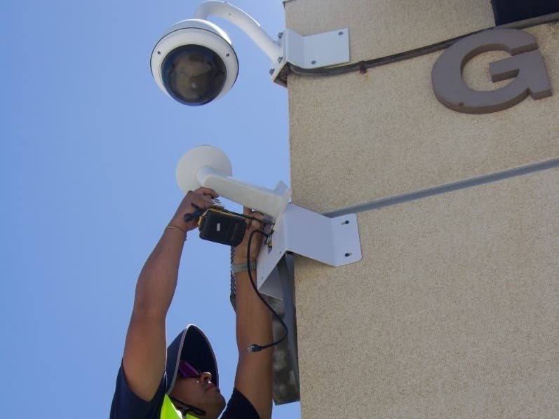 A security camera being installed at a campus within the Beaumont Unified School District.