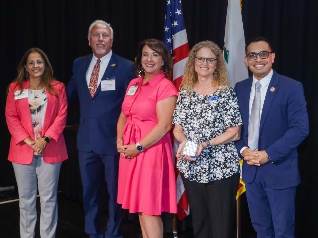 Riverside County 5th District Supervisor Yxstian Gutierrez (far right) stands with BUSD officials (from left): Superintendent Mays Kakish, Board Member Shawn Mitchell, Board Vice President Melissa Williamson, and Board of Trustees President Susie Lara.