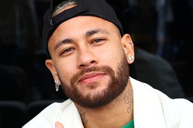 Neymar poses for a photo in the Visa Cash App RB garage prior to the F1 Grand Prix of Bahrain at Bahrain International Circuit on March 02, 2024 in Bahrain, Bahrain. 