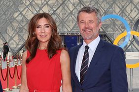 IOC President Thomas Bach (L), his wife Claudia Bach, and King of Demark Frederik X and Queen Mary of Denmark (2R) upon their arrival at the Pyramide du Louvre, designed by Chinese-US architect Ieoh Ming Pei, to attend a gala dinner hosted by the International Olympic Committee (IOC) and the French Presidency at the Louvre Museum in Paris, on the eve of the opening ceremony of the Paris 2024 Olympic Games, on July 25, 2024. 