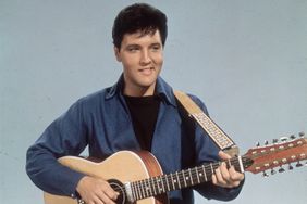 circa 1955: American rock 'n roll singer Elvis Presley (1935 - 1977) with a twelve string guitar.