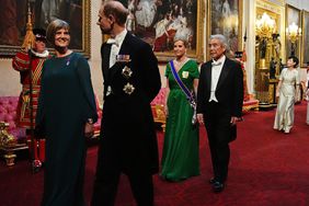 Ms Julia Longbottom (L), Prince Edward, Duke of Edinburgh, Sophie, Duchess of Edinburgh and H.E. Mr. Hirofumi Nakasone (R) make their way along the East Gallery to attend the State Banquet for Emperor Naruhito and his wife Empress Masako of Japan at Buckingham Palace on June 25, 2024 in London, England