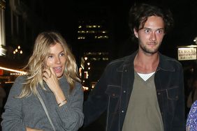 Sienna Miller is seen here arm in arm with her boyfriend Oli Green after a Dinner Date in Covent Garden