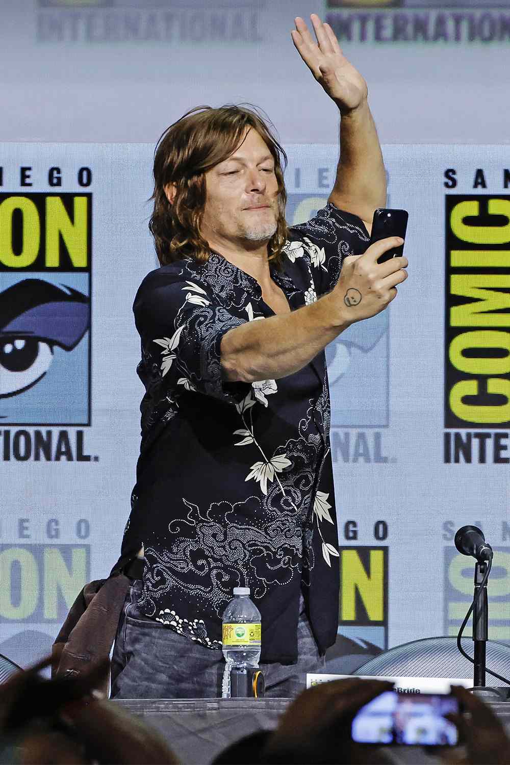 SAN DIEGO, CALIFORNIA - JULY 22: Norman Reedus speaks onstage at AMC's "The Walking Dead" panel during 2022 Comic-Con International: San Diego at San Diego Convention Center on July 22, 2022 in San Diego, California. (Photo by Kevin Winter/Getty Images)