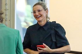 Actress Cameron Diaz makes aÂ rareÂ appearance as she is seen chatting with her friend in the valet parking area in Beverly Hills.