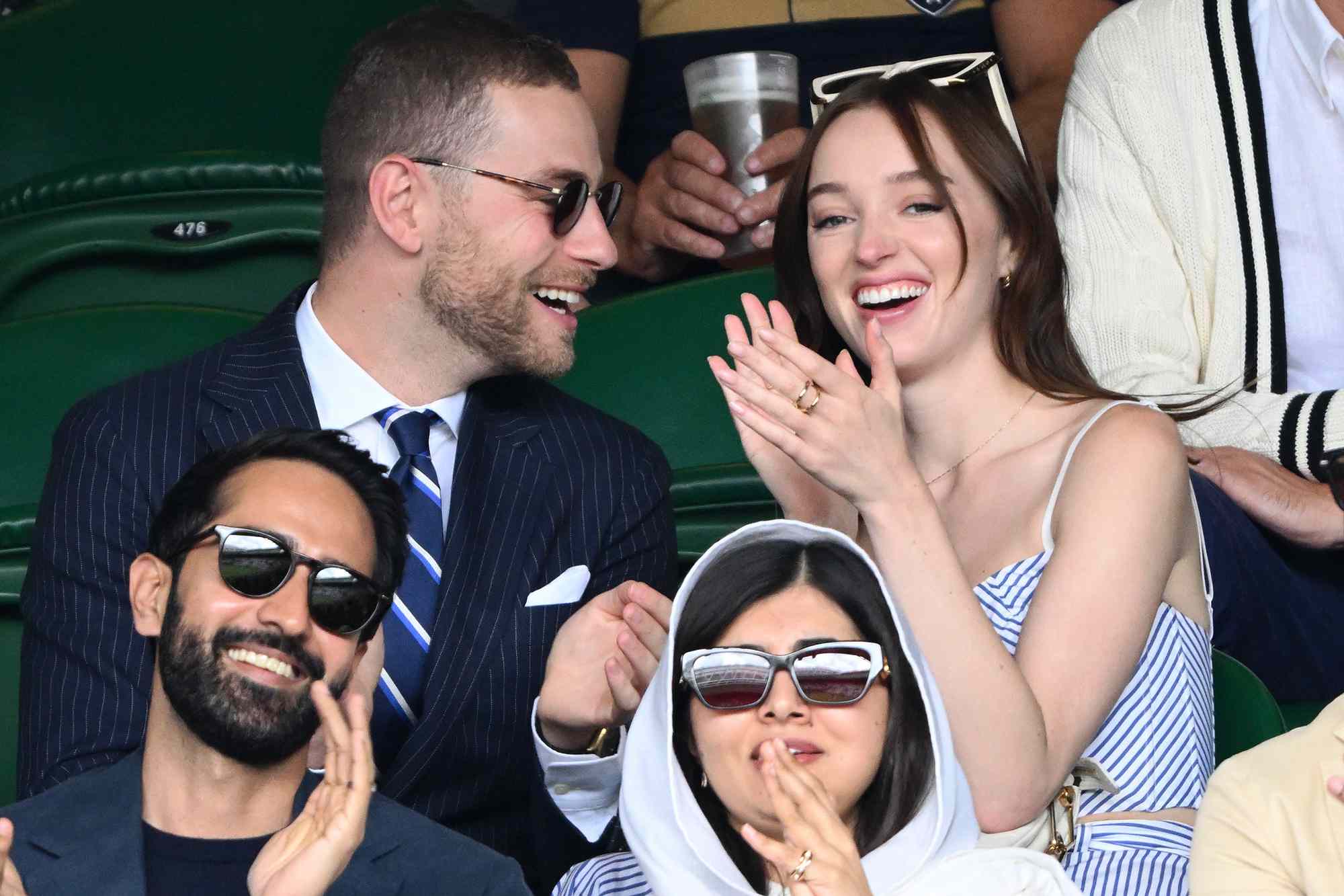 Cameron Fuller and Phoebe Dynevor attend day seven of the Wimbledon Tennis Championships at All England Lawn Tennis and Croquet Club on July 09, 2023 in London, England.