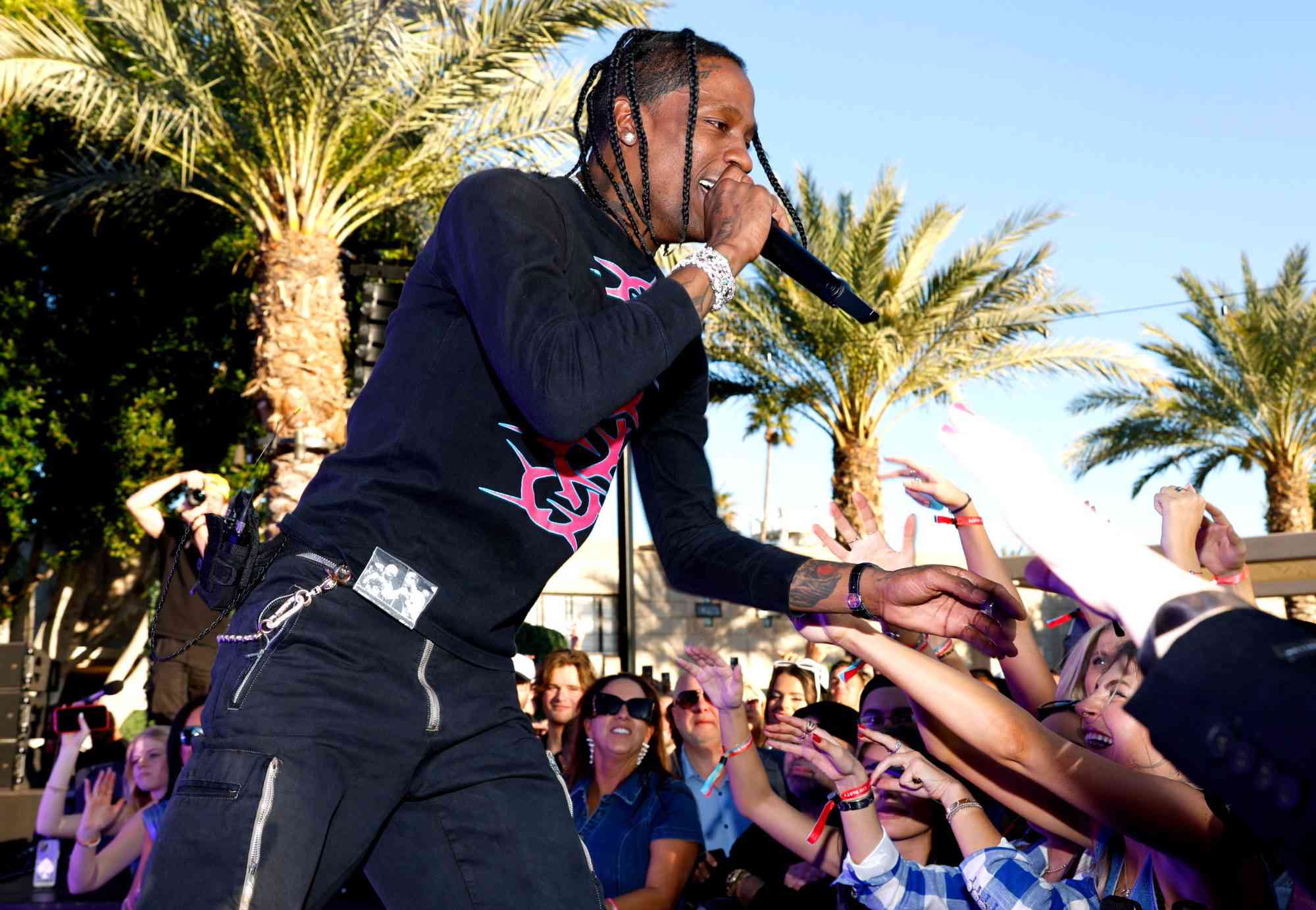 PHOENIX, ARIZONA - FEBRUARY 11: Travis Scott performs during Michael Rubin's 2023 Fanatics Super Bowl Party at the Arizona Biltmore on February 11, 2023 in Phoenix, Arizona. (Photo by Mike Coppola/Getty Images for Fanatics)