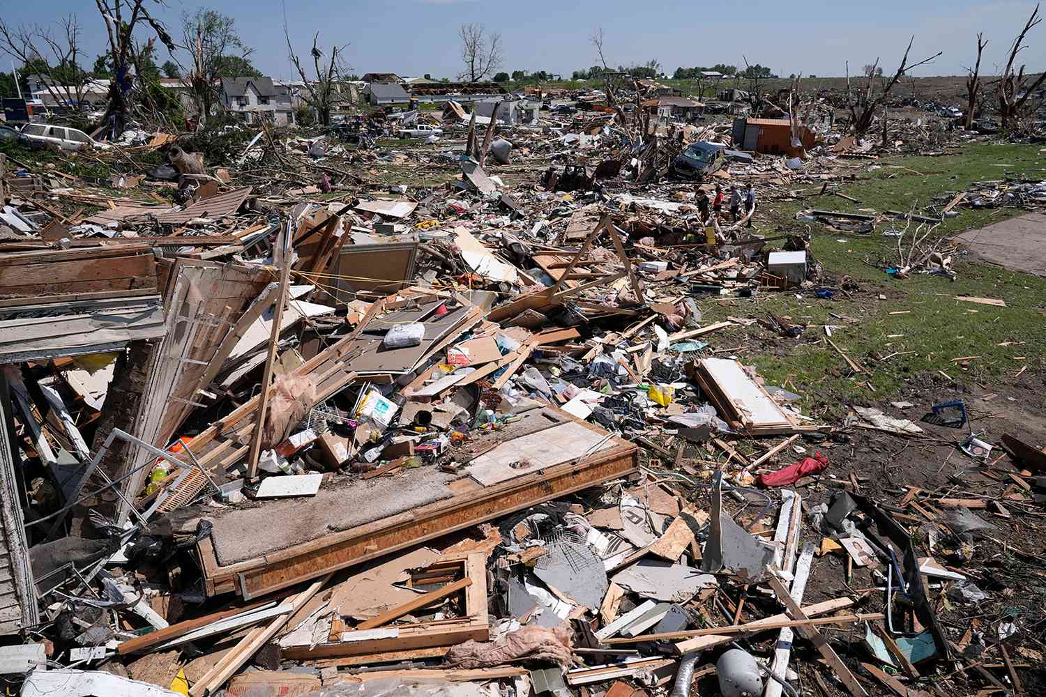 Debris from tornado damaged homes is seen, Wednesday, May 22, 2024, in Greenfield, Iowa